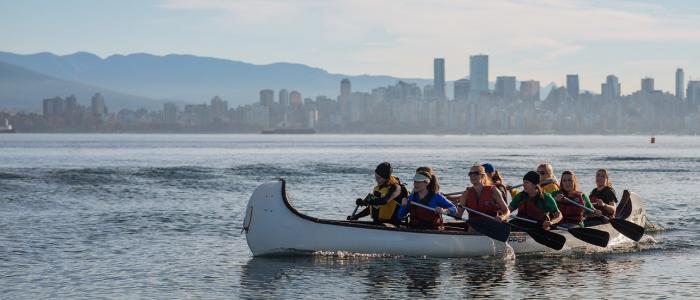 UBC students dragon boating in the ocean