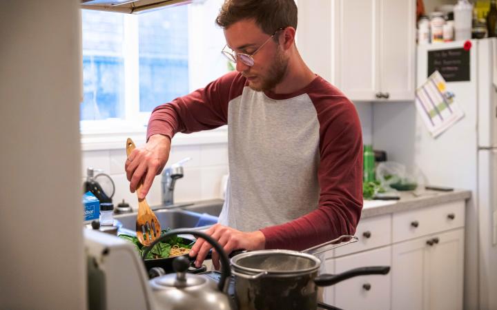 Student cooking in their kitchen