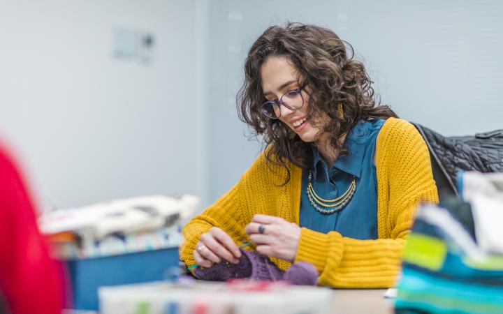 Club member knitting