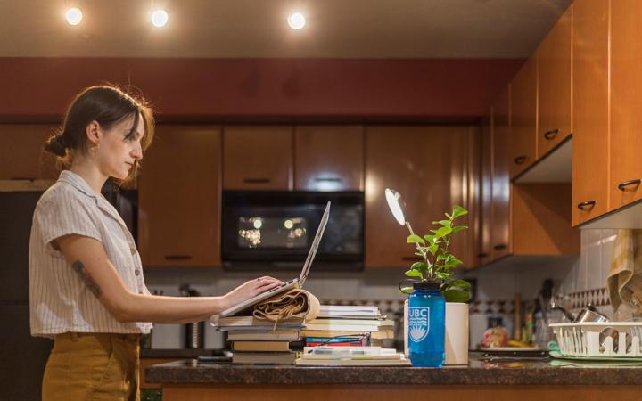 A student preparing for an online presentation